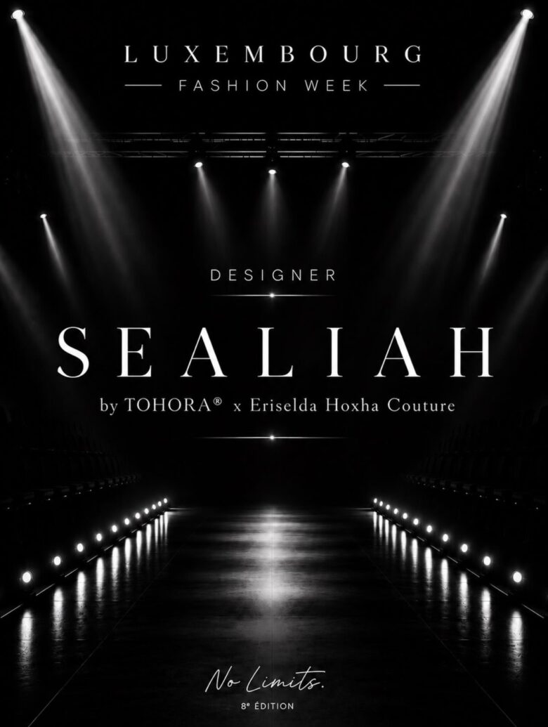 Affiche noir et blanc du défilé Séaliah by Tohora® x Eriselda Hoxha Couture, 8ᵉ édition de la Luxembourg Fashion Week, sur un podium éclairé de projecteurs.